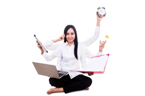 Businesswoman multitasking isolated